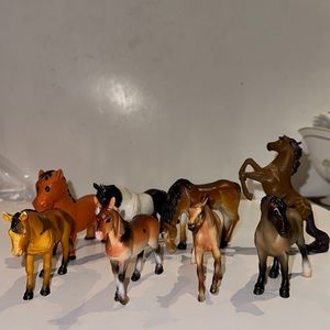 Lot of 8 miniature horses.  3 Breyer, 1 Dwal and rest are no name